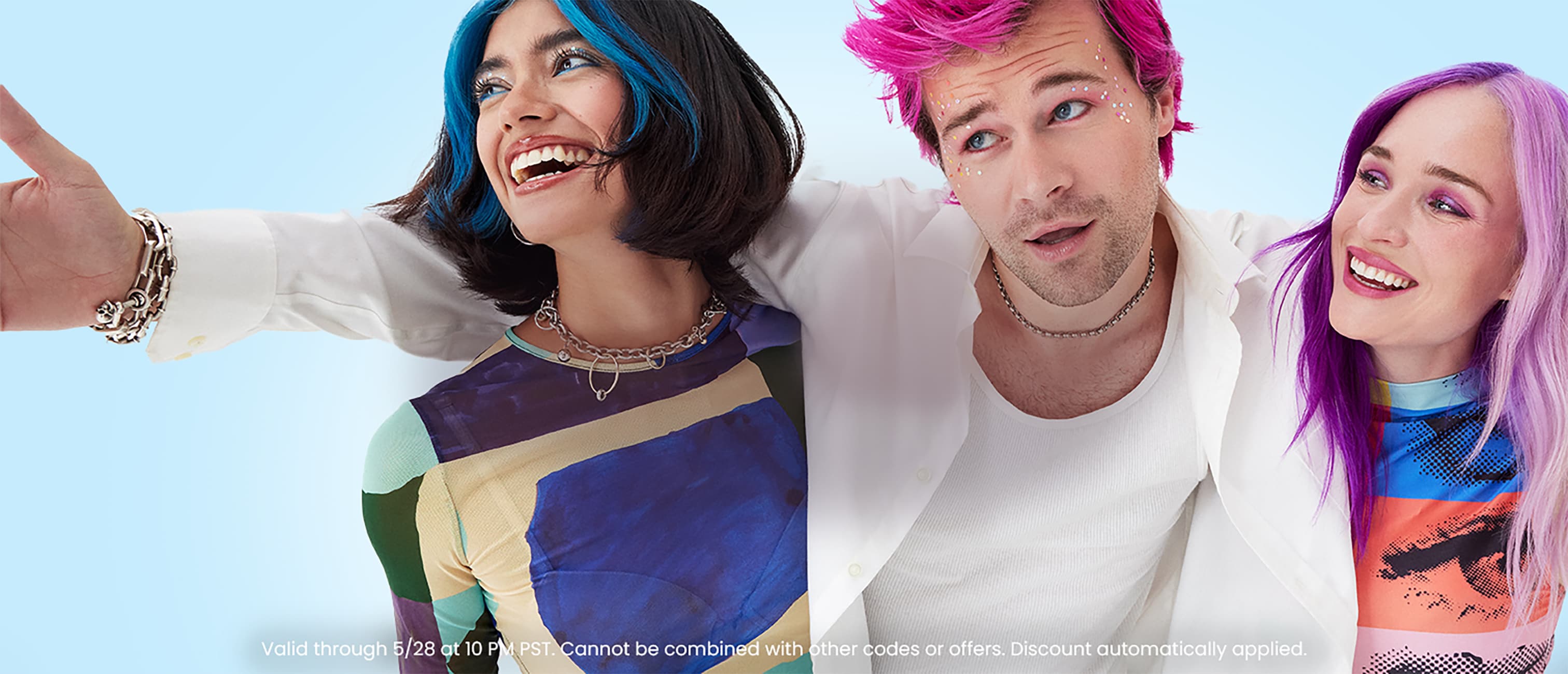 Joyful group showcasing Arctic Fox's vibrant hair colors: woman with Aquamarine highlights, man styled in Virgin Pink, and woman flaunting Girls Night—expressing unique, bold styles.
